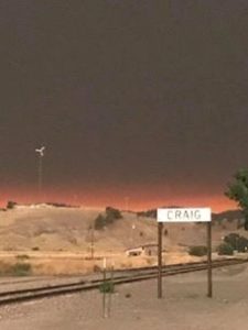 Montana fires darken the afternoon sky in Craig.